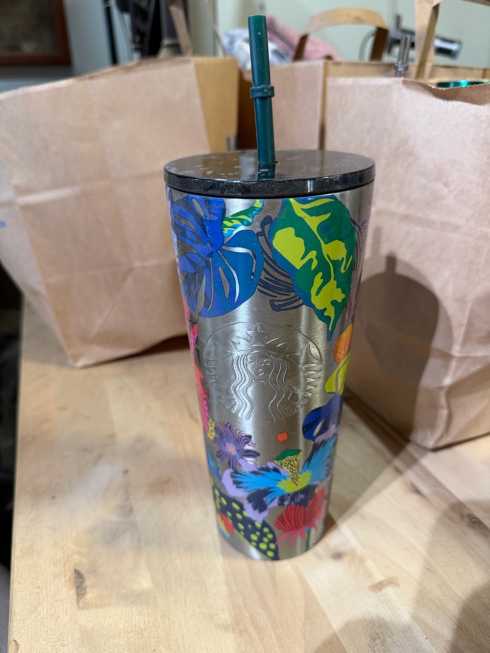 Starbucks Stainless Silver Tumbler with Bright Green and Blue Floral Accents